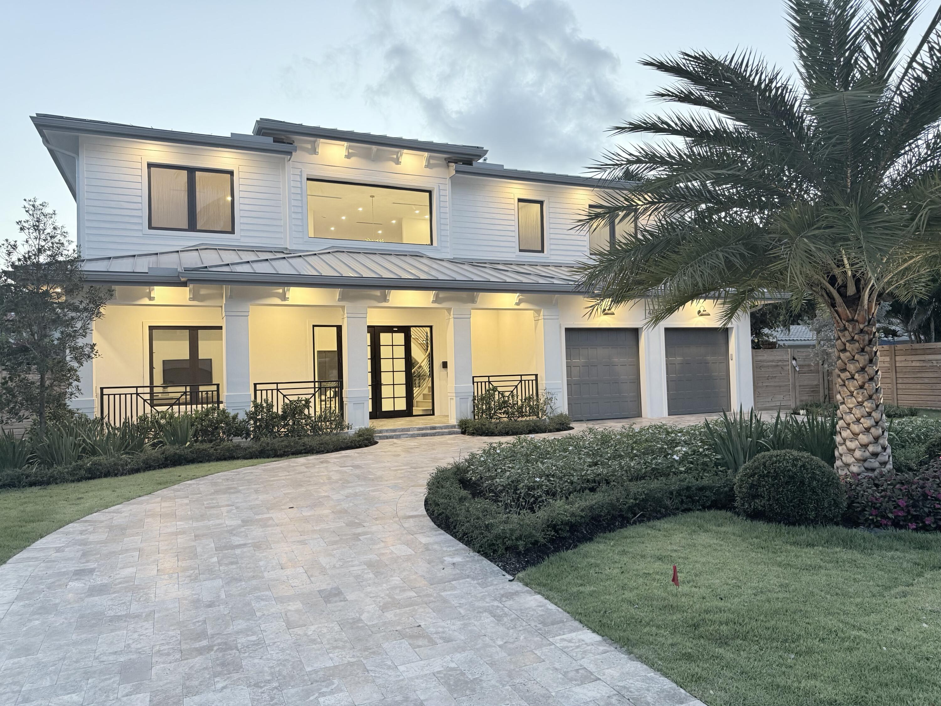 451 Northwest 7th Avenue Boca Raton, FL 33486 - Photo 3 of 52 Front Twilight