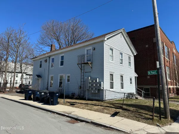a view of a house with street