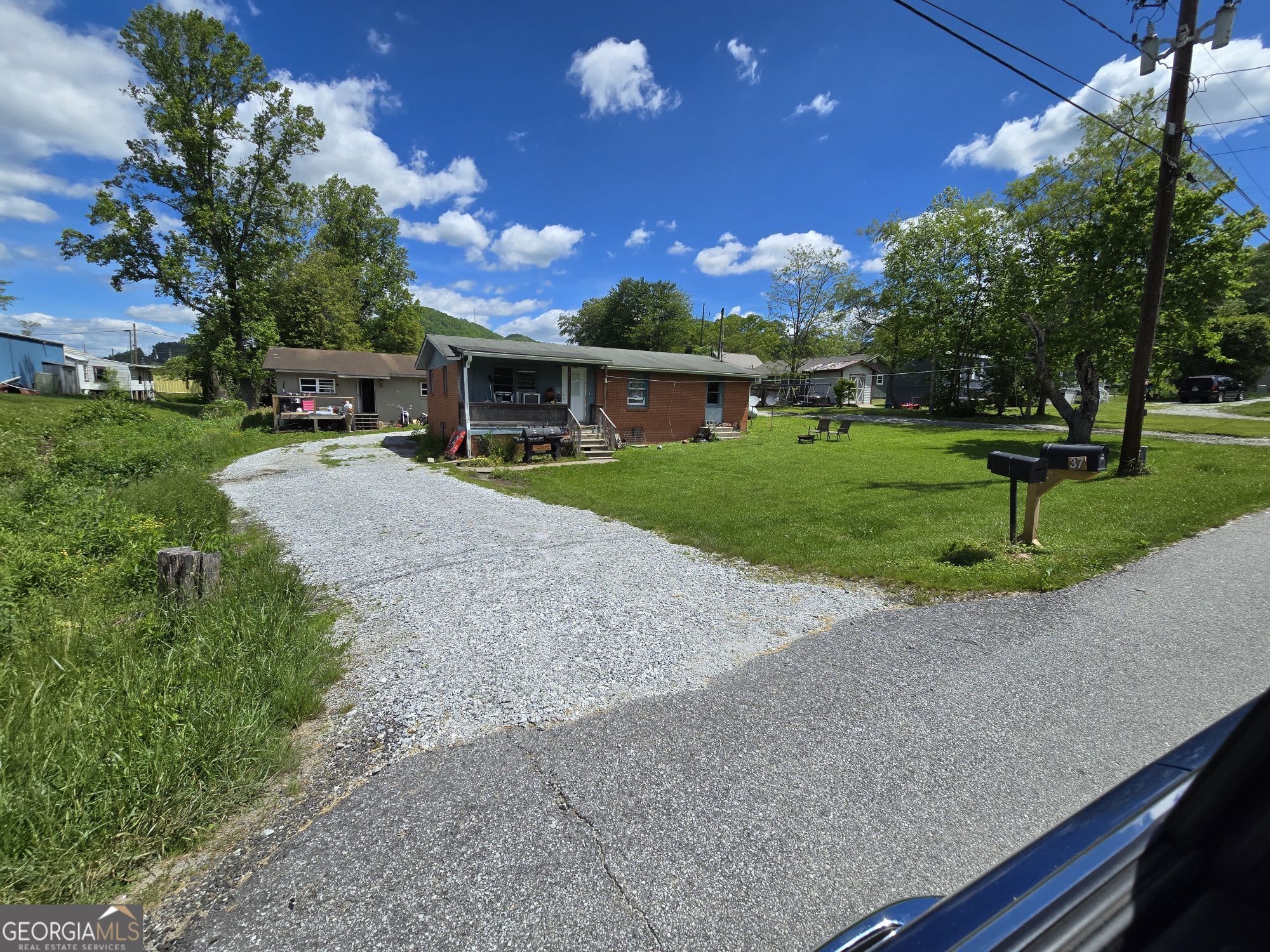 37 Erwin Street Clayton, GA 30525 - Photo 3 of 4 a front view of house with yard and green space