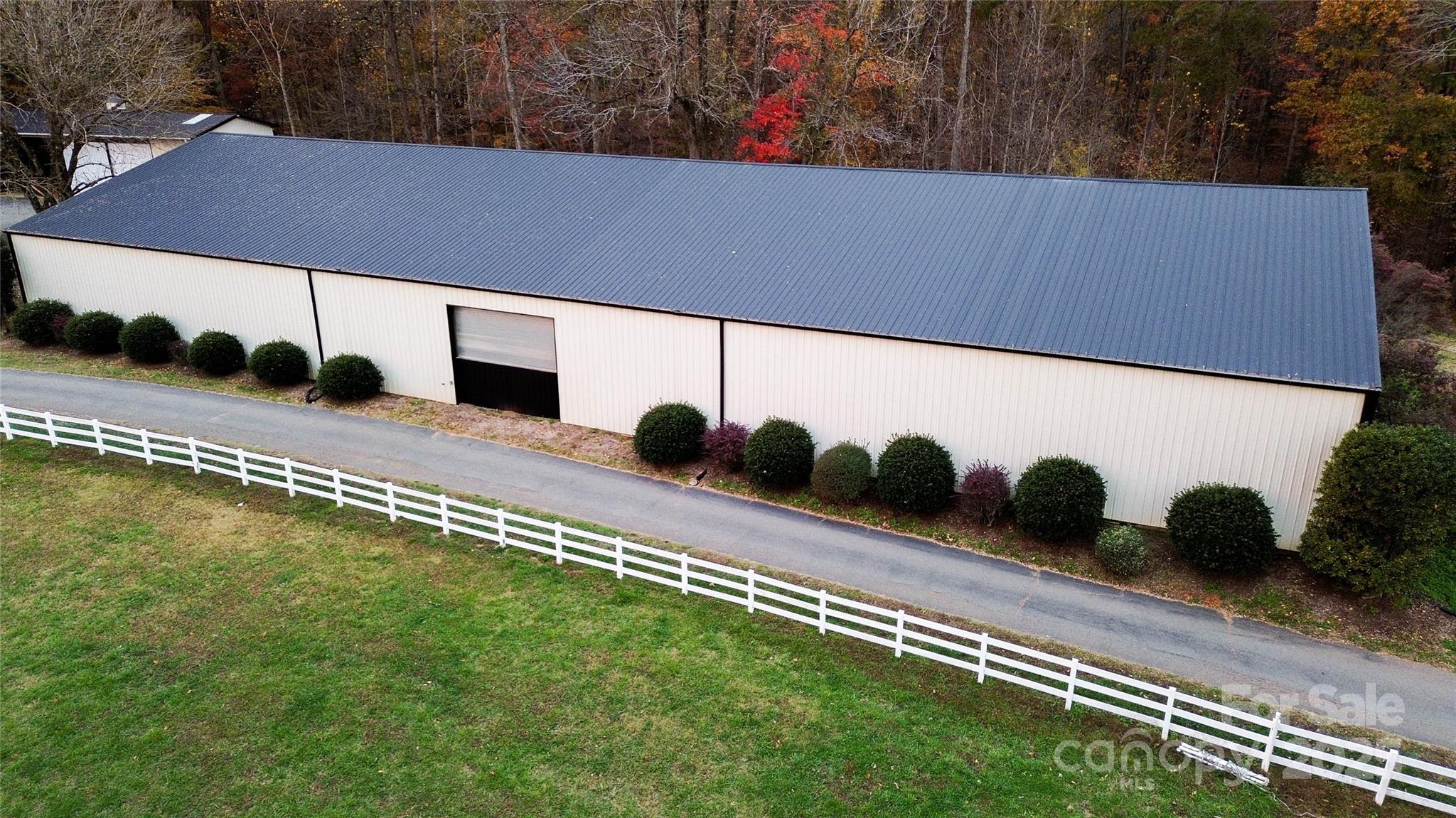 10600 Archer Road Davidson, NC 28036 - Photo 20 of 22 a view of a swimming pool with an outdoor seating