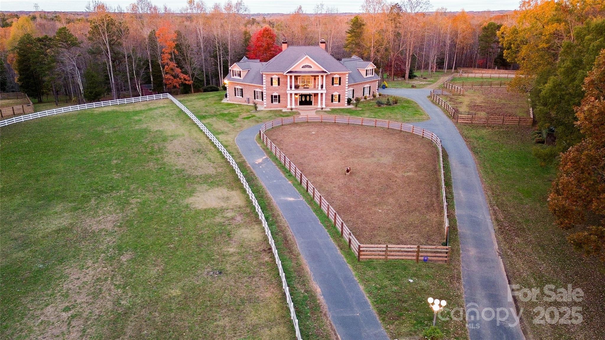 10600 Archer Road Davidson, NC 28036 - Photo 2 of 22 a view of a house with a yard