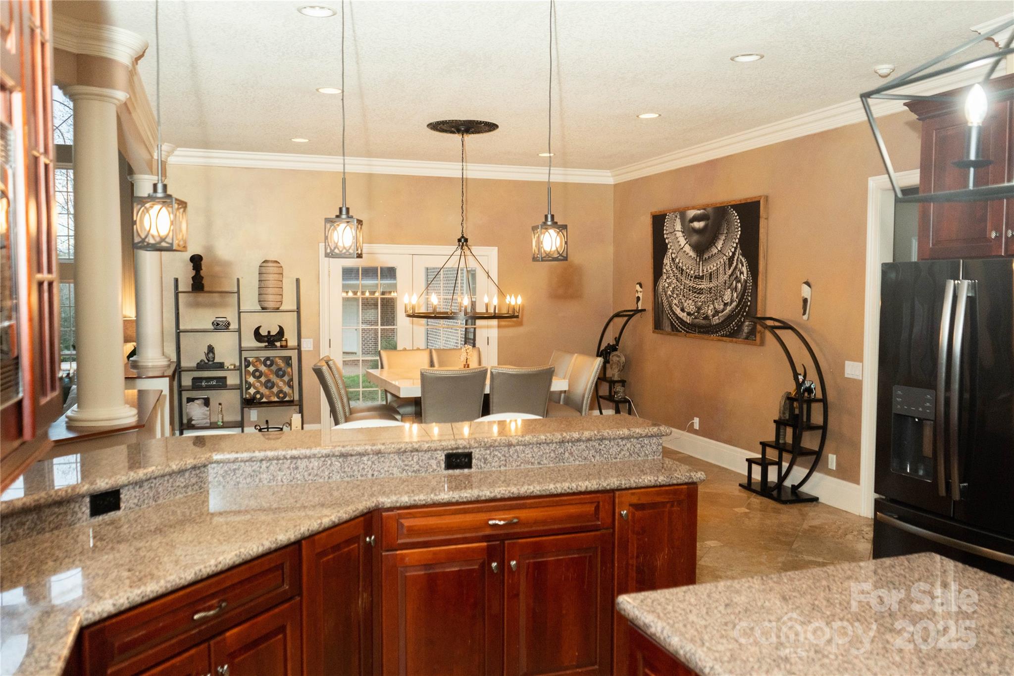 10600 Archer Road Davidson, NC 28036 - Photo 6 of 22 a kitchen with stainless steel appliances granite countertop a sink and a refrigerator
