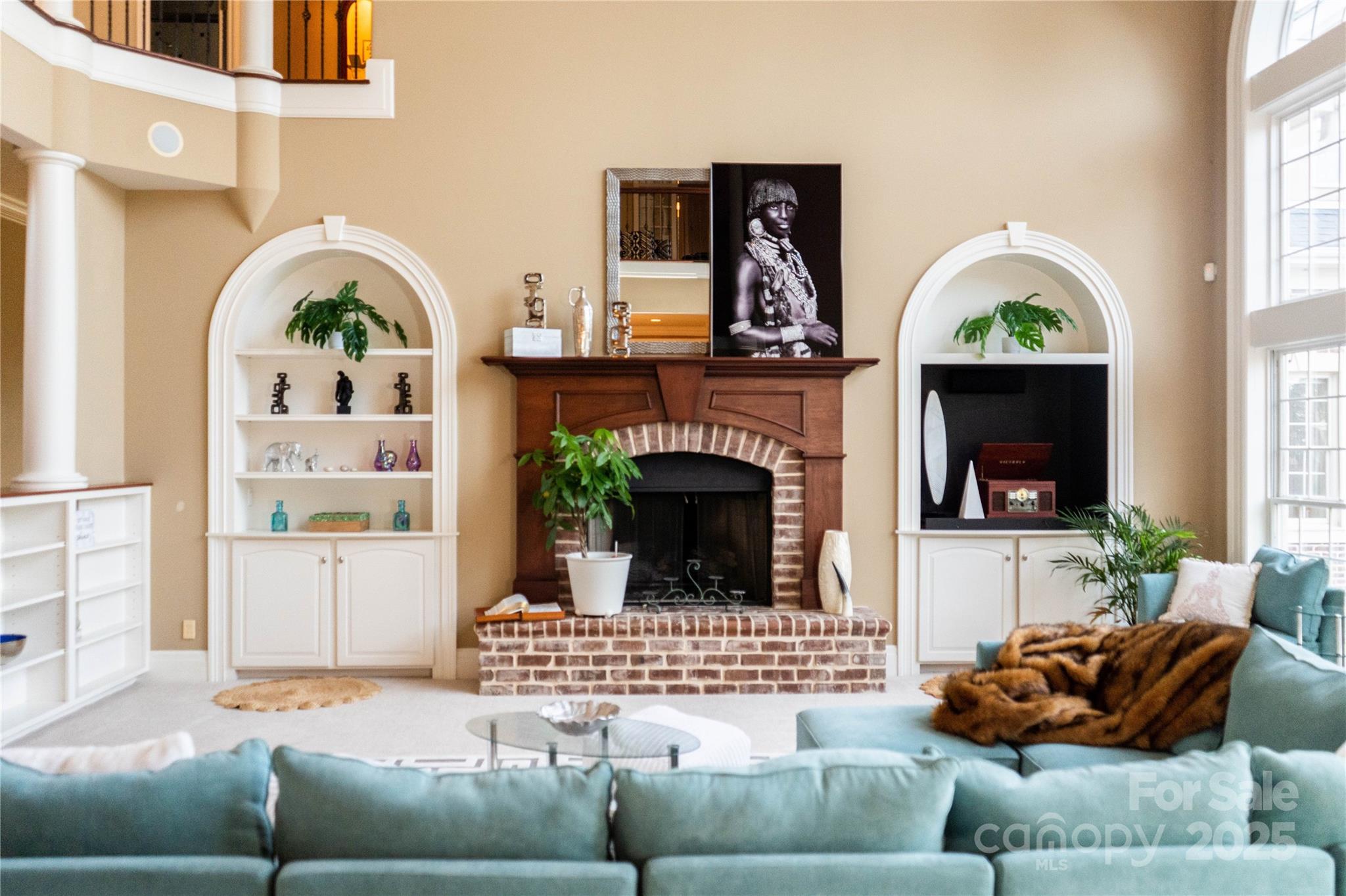 10600 Archer Road Davidson, NC 28036 - Photo 7 of 22 a living room with furniture a fireplace and a window