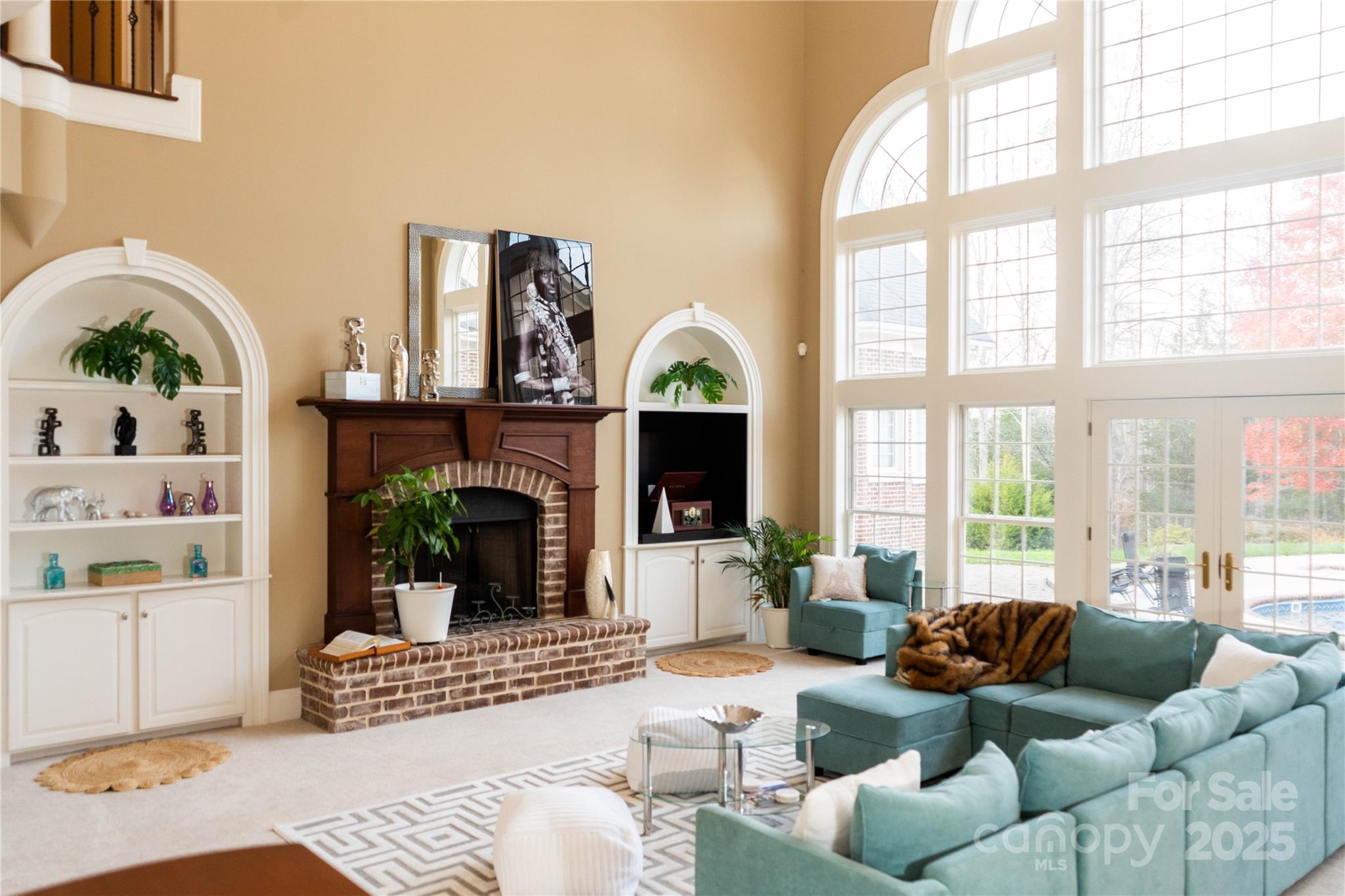 10600 Archer Road Davidson, NC 28036 - Photo 8 of 22 a living room with furniture fireplace and window