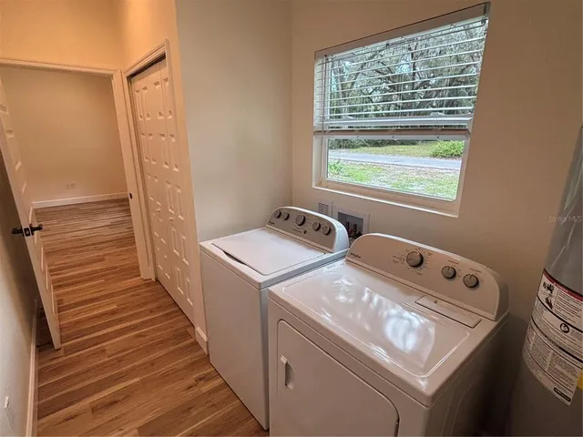 a utility room with dryer and washer
