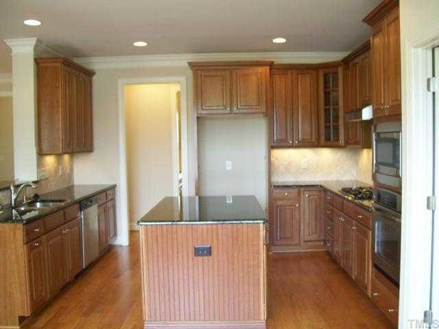 534 Chapanoke Road Raleigh, NC 27603 - Photo 4 of 12 Another view of the spacious kitchen with a center island. Kitchen