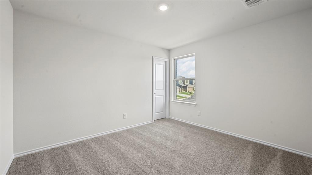 650 Glee Stem Road Lavon, TX 75166 - Photo 21 of 22 a view of an empty room and window