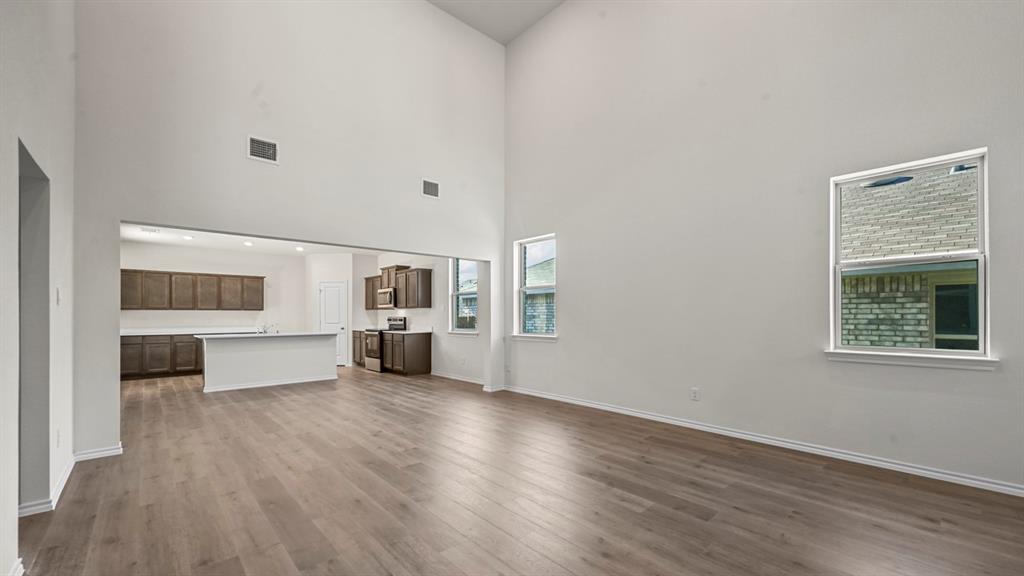 650 Glee Stem Road Lavon, TX 75166 - Photo 9 of 22 a view of livingroom with furniture flat screen tv and window