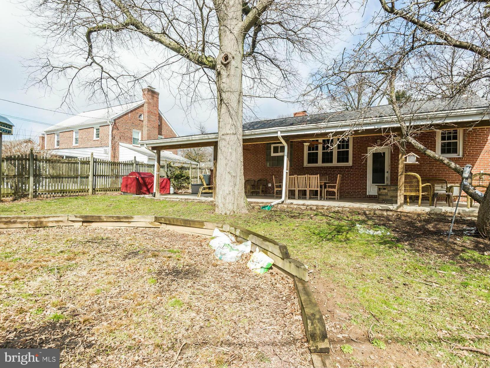 411 Aigburth Road Towson, MD 21286 - Photo 22 of 23 front view of a house with a yard
