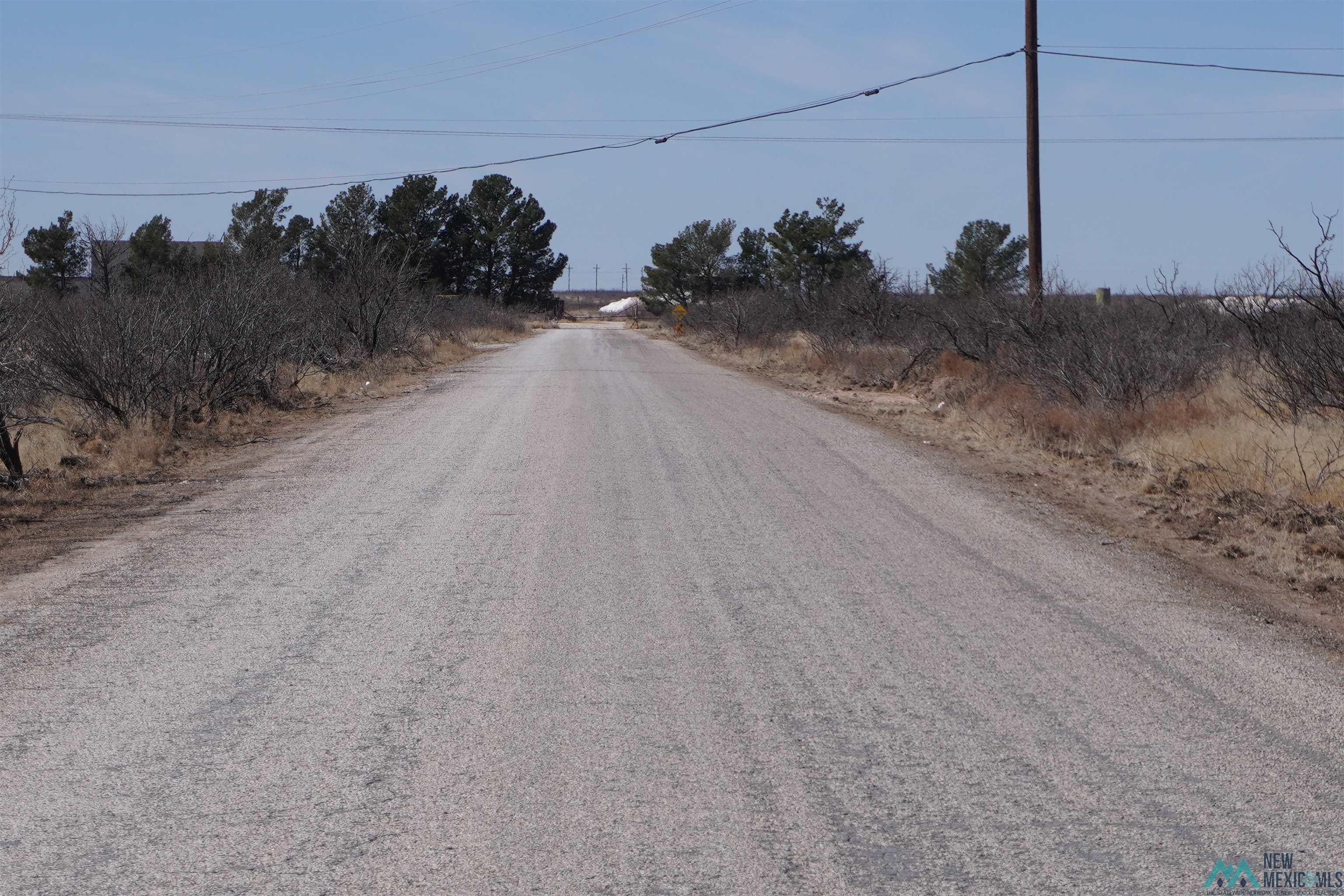 563 Childress Road Monument, NM 88265 - Photo 1 of 8 View of street featuring a view of countryside