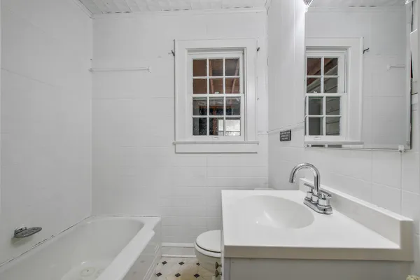 a bathroom with a sink and a bathtub