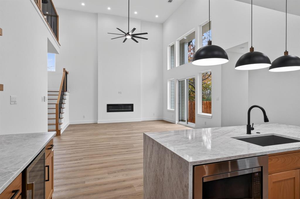 2007 North Montclair Avenue Dallas, TX 75208 - Photo 7 of 25 a kitchen with a sink a counter space and wooden floor