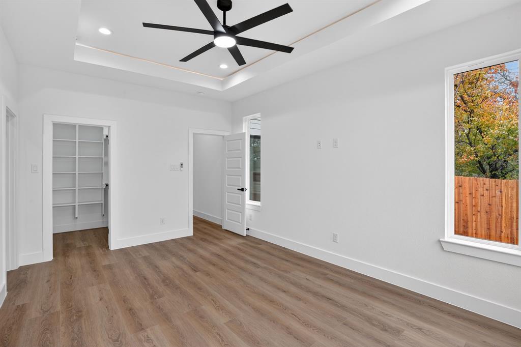 2007 North Montclair Avenue Dallas, TX 75208 - Photo 10 of 25 wooden floor in an empty room with a window