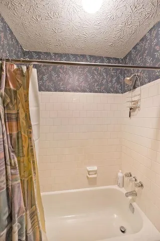 a bathroom with a bathtub