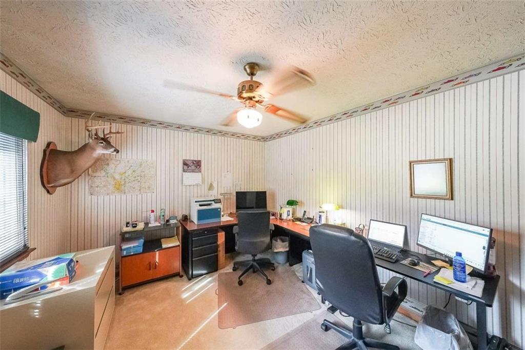 183 Timothy Lane Northwest Lilburn, GA 30047 - Photo 25 of 32 a workspace with furniture