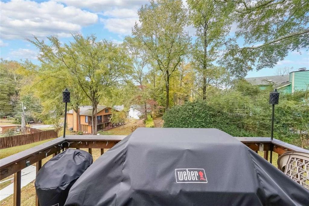 183 Timothy Lane Northwest Lilburn, GA 30047 - Photo 29 of 32 a view of a swimming pool with an outdoor seating