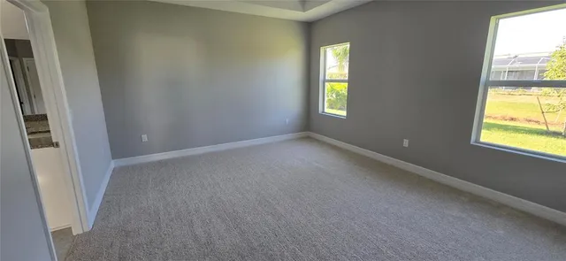 an empty room with windows