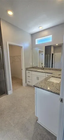 wooden floor with a kitchen sink