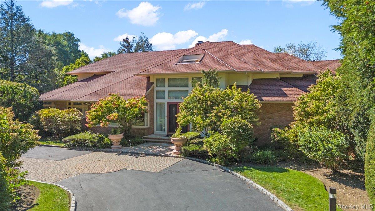 12 Ridge Court Glen Head, NY 11545 - Photo 2 of 46 a view of a house with a yard and potted plants