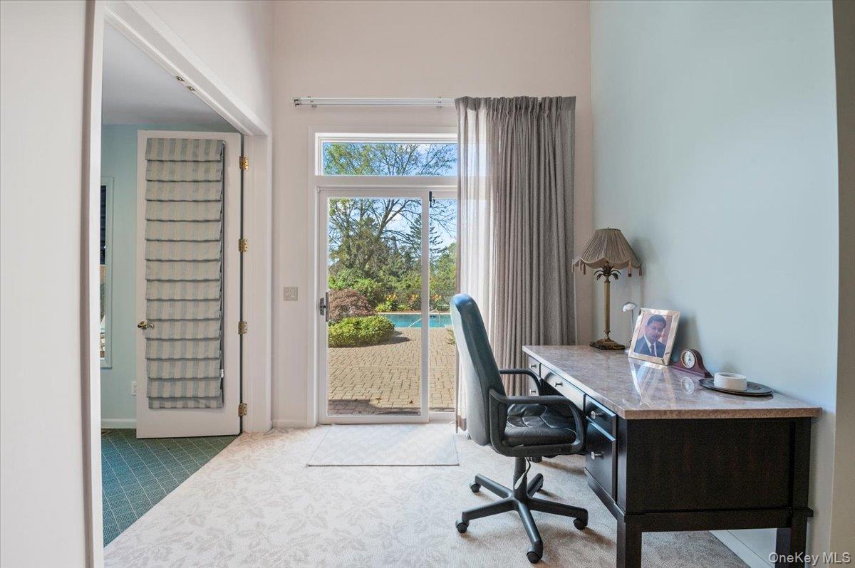 12 Ridge Court Glen Head, NY 11545 - Photo 23 of 46 a view of a workspace with furniture and a window