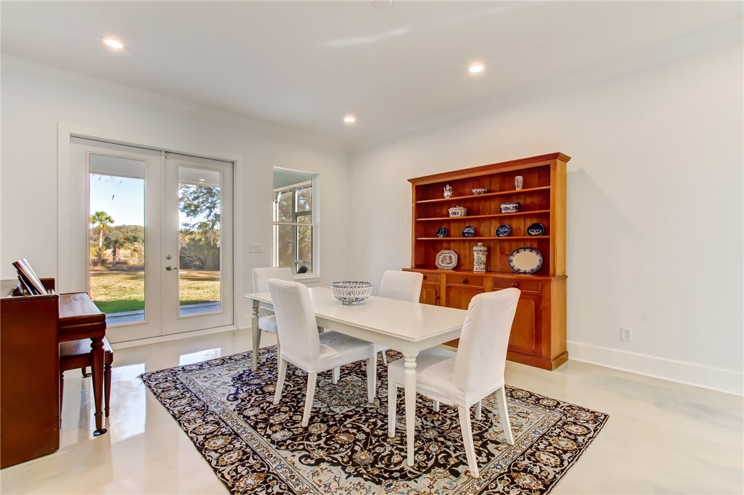 521 Bonnieview Road Fernandina Beach, FL 32034 - Photo 14 of 35 a view of a dining room with furniture window and wooden floor