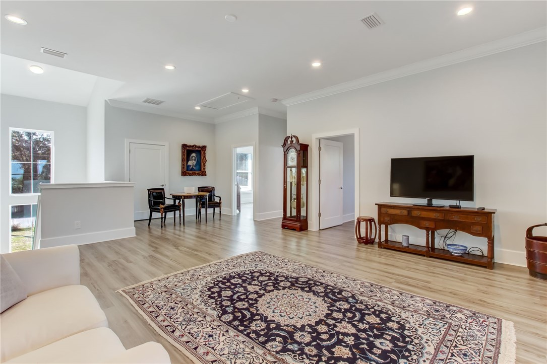 521 Bonnieview Road Fernandina Beach, FL 32034 - Photo 19 of 35 a living room with furniture and a flat screen tv
