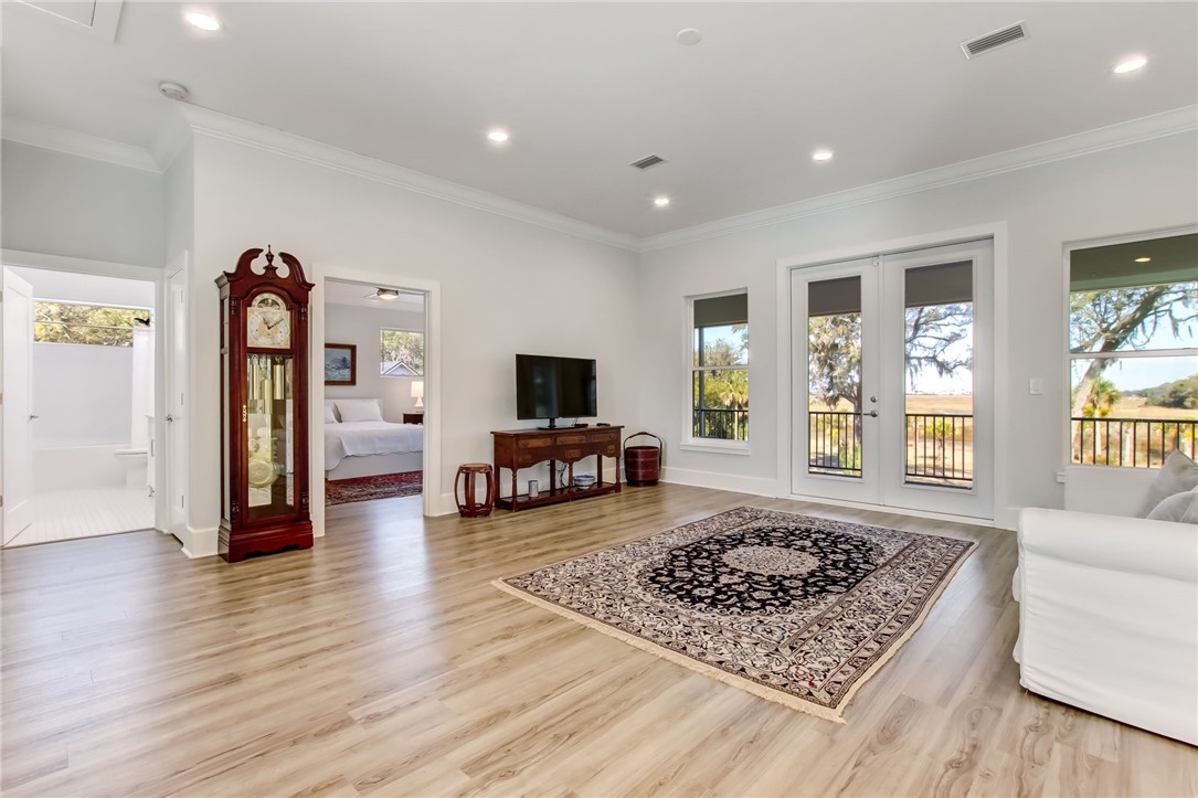 521 Bonnieview Road Fernandina Beach, FL 32034 - Photo 21 of 35 a living room with furniture and a rug