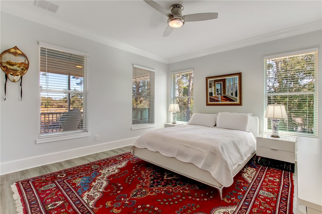 521 Bonnieview Road Fernandina Beach, FL 32034 - Photo 26 of 35 a bedroom with a large bed and a window
