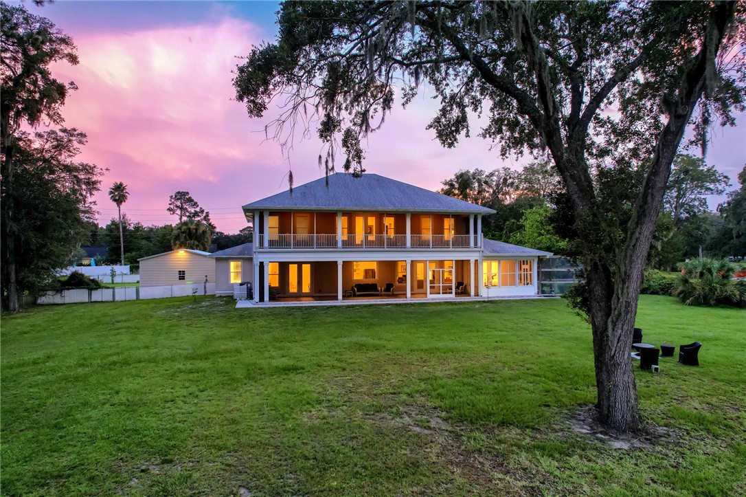 521 Bonnieview Road Fernandina Beach, FL 32034 - Photo 31 of 35 a front view of a house with a yard