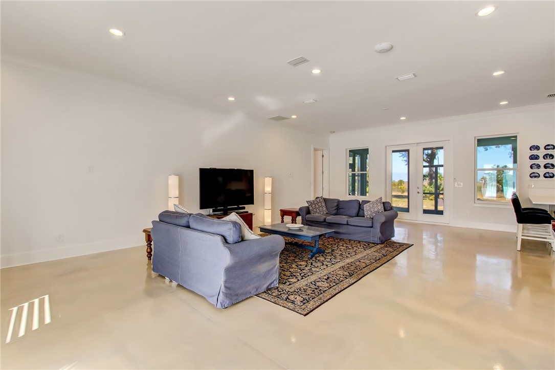 521 Bonnieview Road Fernandina Beach, FL 32034 - Photo 6 of 35 a living room with furniture and a flat screen tv