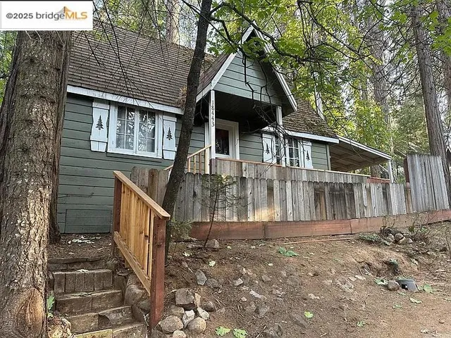 a front view of a house with a porch