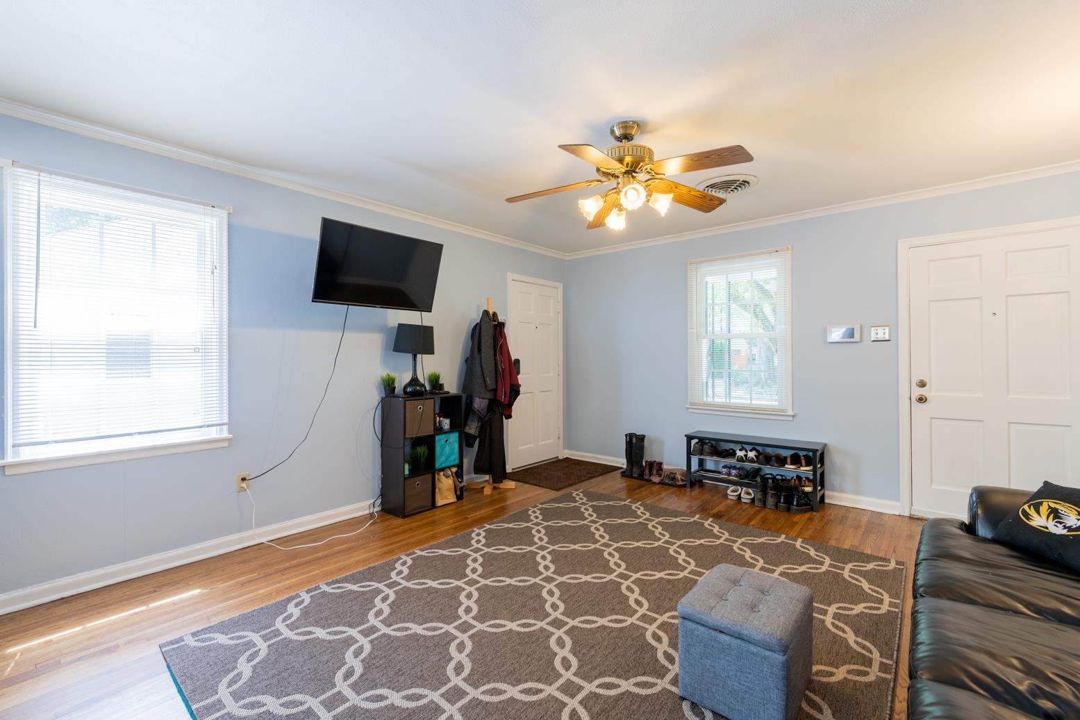 4634 Amboy Road Memphis, TN 38117 - Photo 9 of 23 a living room with furniture ceiling fan and a window
