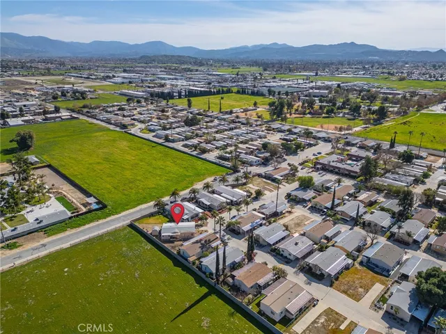 a view of swimming pool with outdoor seating and yard