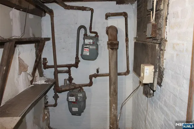 a kitchen with stainless steel appliances granite countertop a stove and a microwave