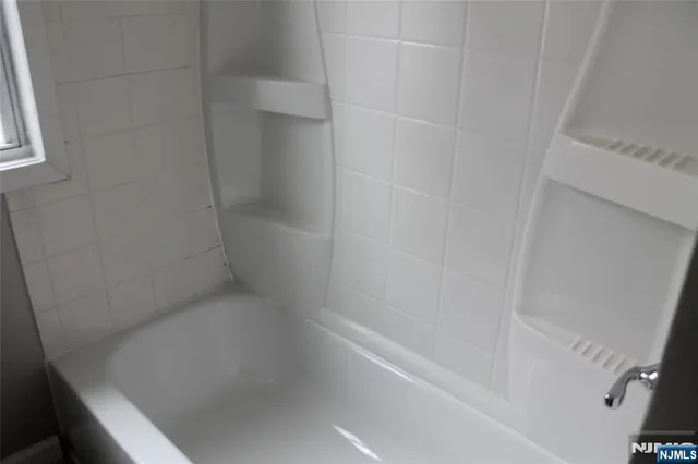 a close up of a bathtub