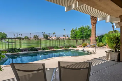 a view of a swimming pool and a terrace