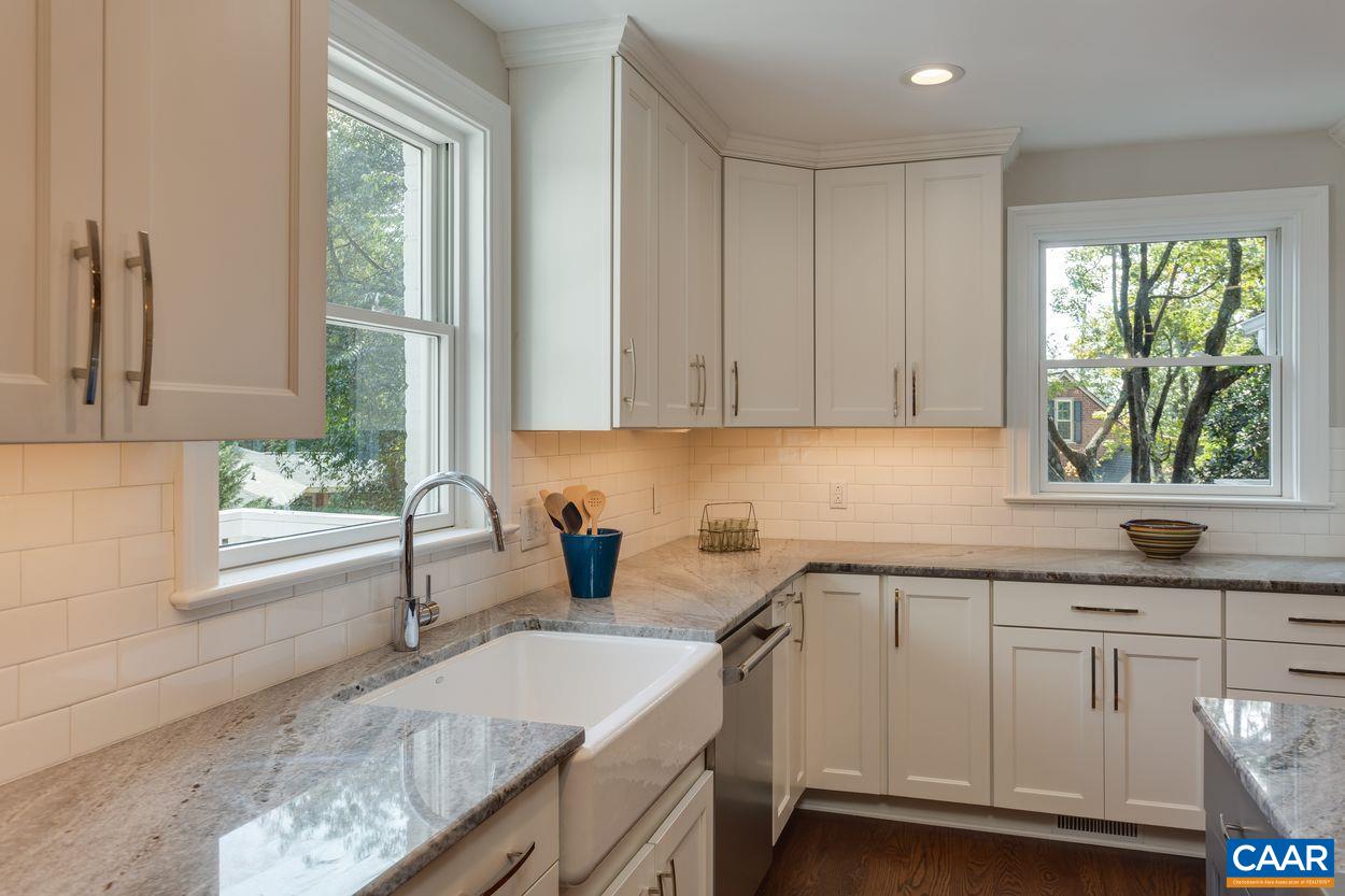 316 Kent Road Charlottesville, VA 22903 - Photo 18 of 47 a kitchen with sink cabinets and window
