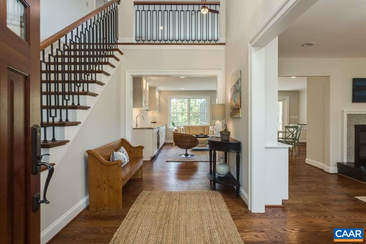316 Kent Road Charlottesville, VA 22903 - Photo 5 of 47 a living room with furniture wooden floor and a chandelier
