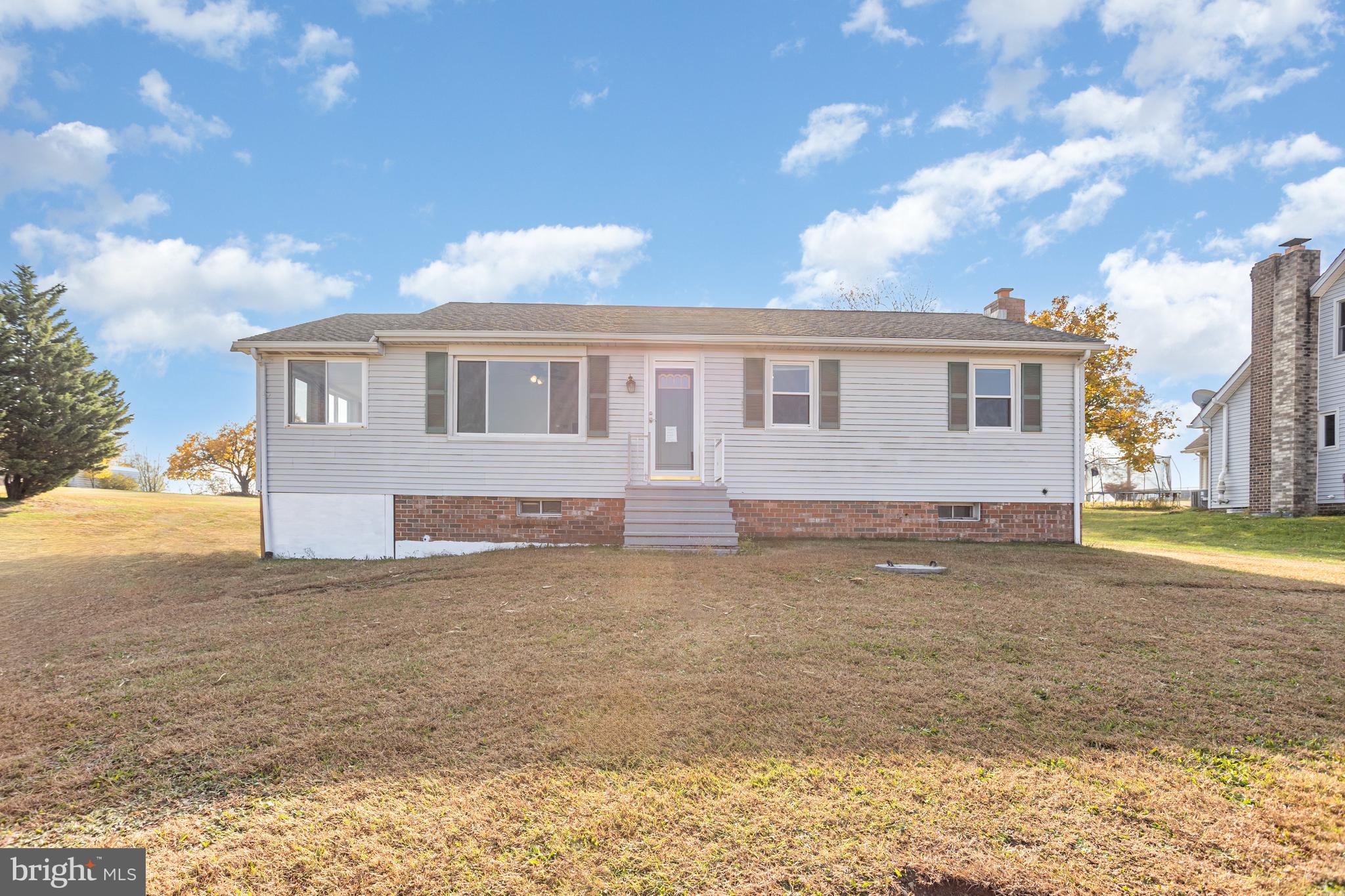 1487 Kbs Road Spring Grove, PA 17362 - Photo 1 of 35 a front view of a house with a yard and garage