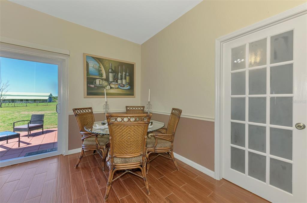 2700 Verna Bethany Road Myakka City, FL 34251 - Photo 20 of 61 a view of a dining room with furniture window and outside view