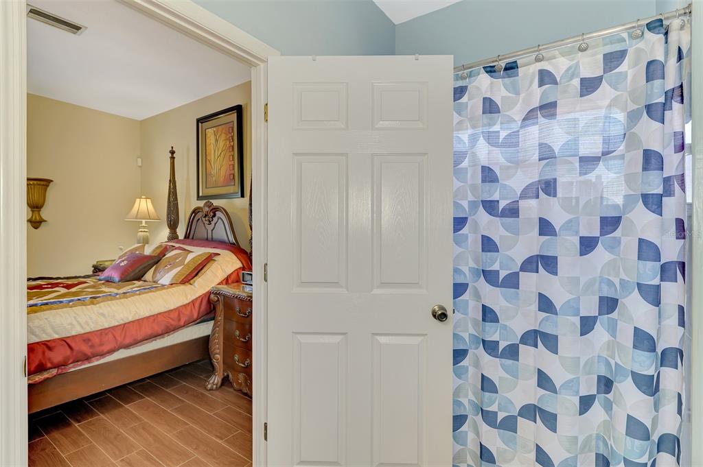 2700 Verna Bethany Road Myakka City, FL 34251 - Photo 30 of 61 a bed room with a bed and a chair