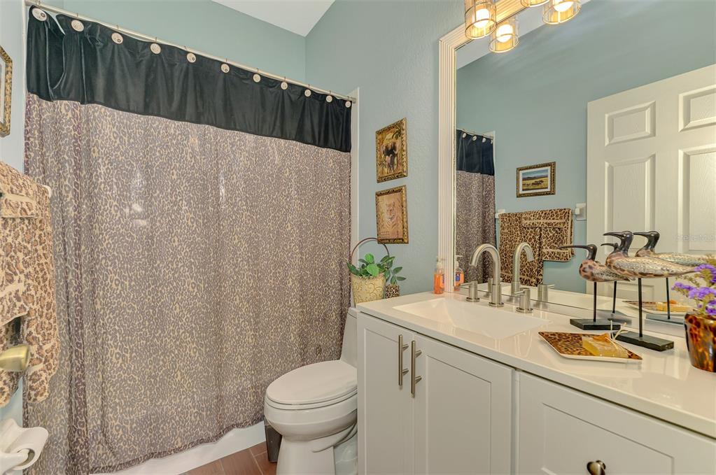 2700 Verna Bethany Road Myakka City, FL 34251 - Photo 33 of 61 a bathroom with a sink and a mirror