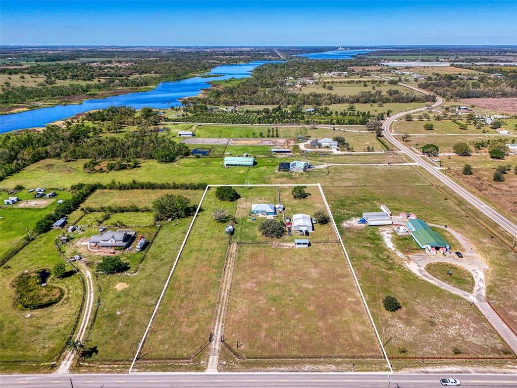 2700 Verna Bethany Road Myakka City, FL 34251 - Photo 4 of 61 a view of a swimming pool with an ocean view