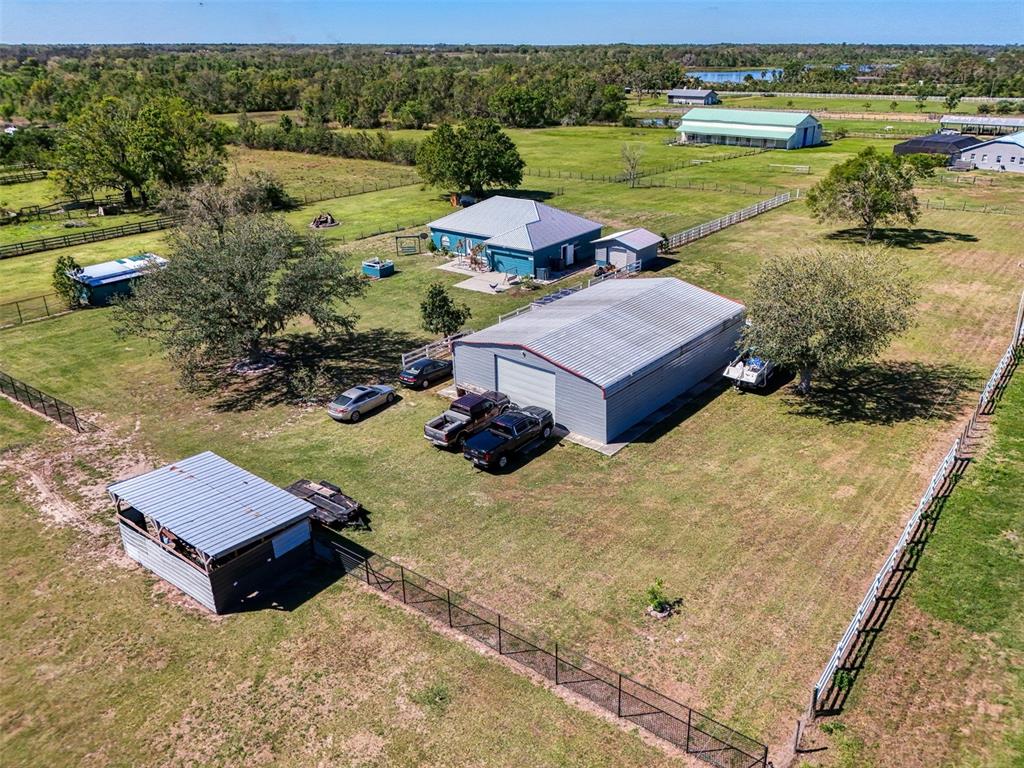 2700 Verna Bethany Road Myakka City, FL 34251 - Photo 47 of 61 an aerial view of a house with garden space and street view