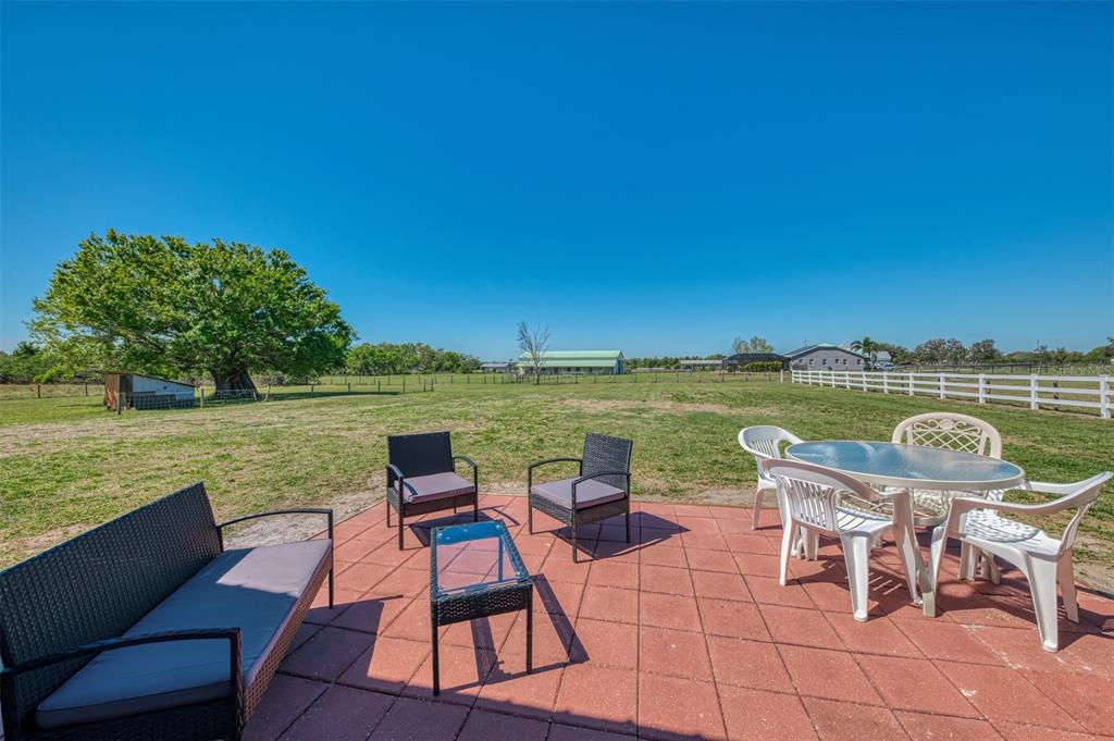2700 Verna Bethany Road Myakka City, FL 34251 - Photo 61 of 61 a view of a lake with furniture
