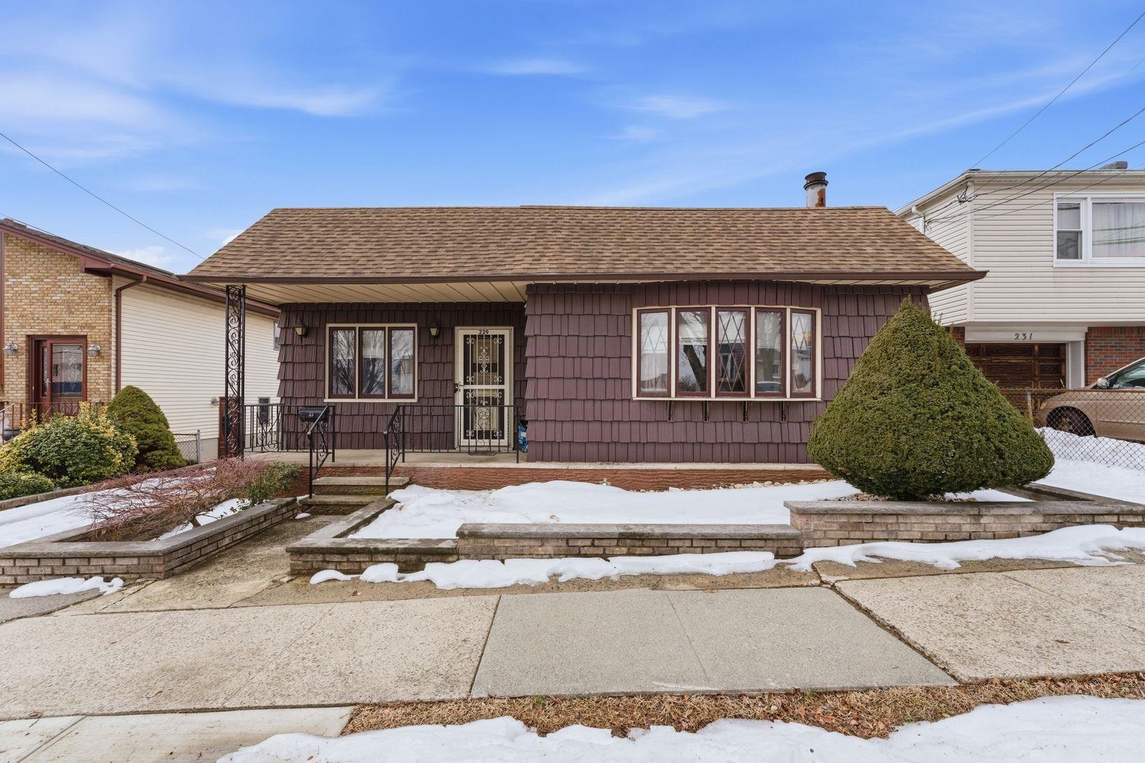 229 Centre Avenue Secaucus, NJ 07094 - Photo 1 of 40 front view of a house