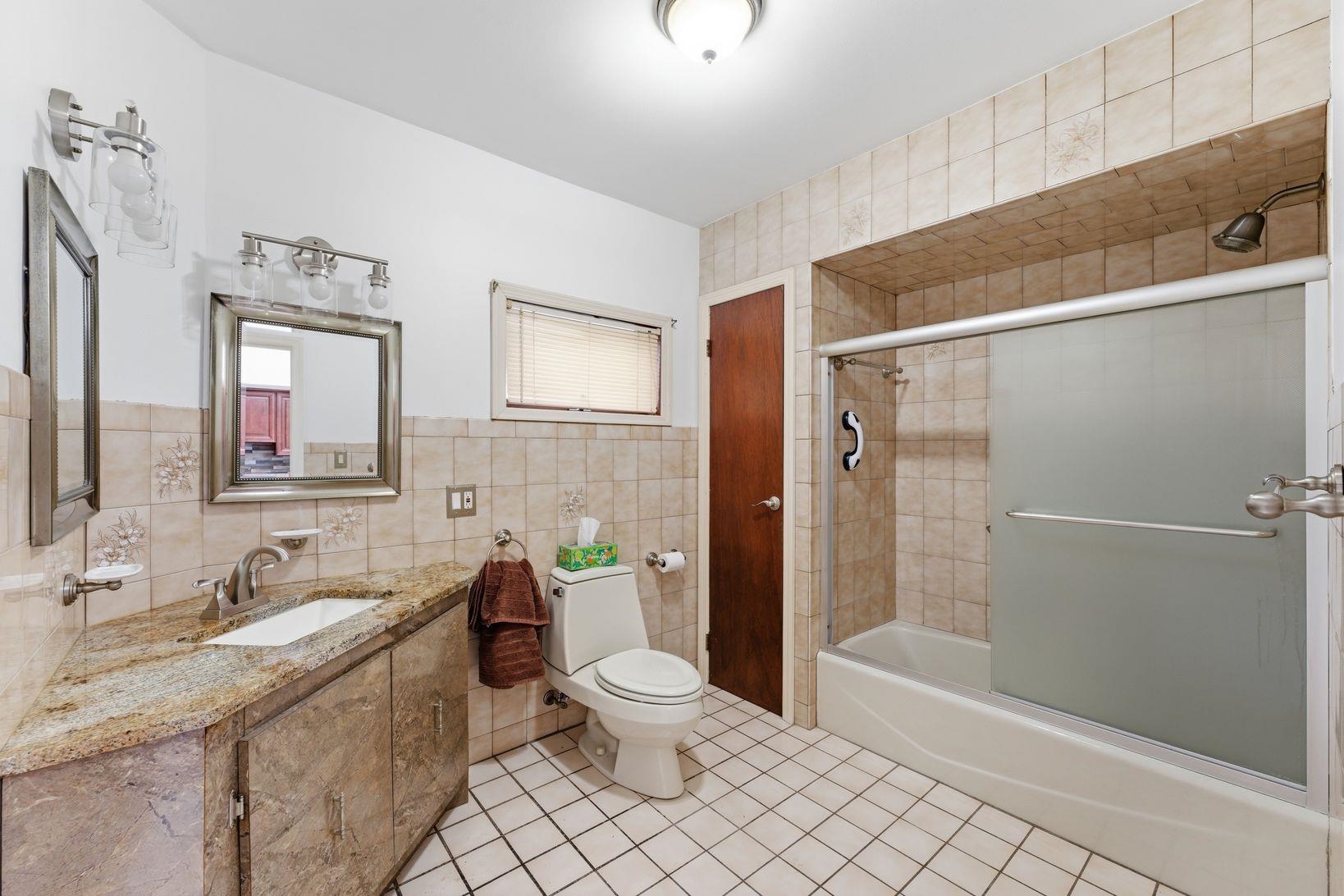 229 Centre Avenue Secaucus, NJ 07094 - Photo 13 of 40 a bathroom with a sink a toilet and shower