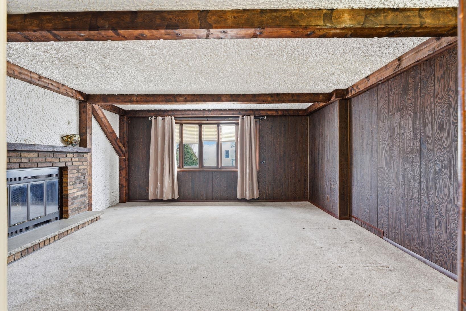 229 Centre Avenue Secaucus, NJ 07094 - Photo 15 of 40 a view of an empty room with a fireplace