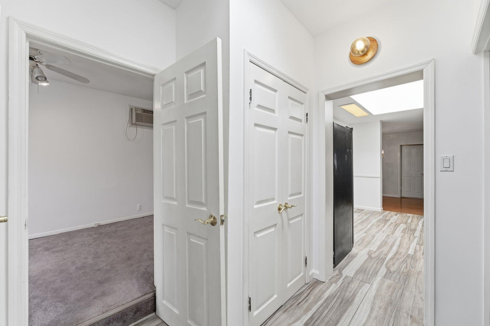 229 Centre Avenue Secaucus, NJ 07094 - Photo 25 of 40 a view of a hallway with wooden floor