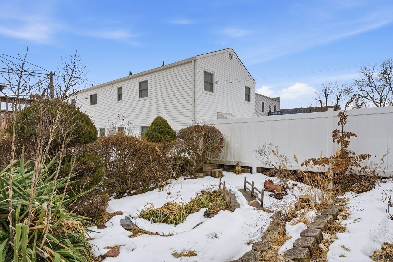 229 Centre Avenue Secaucus, NJ 07094 - Photo 37 of 40 a view of a back yard of the house